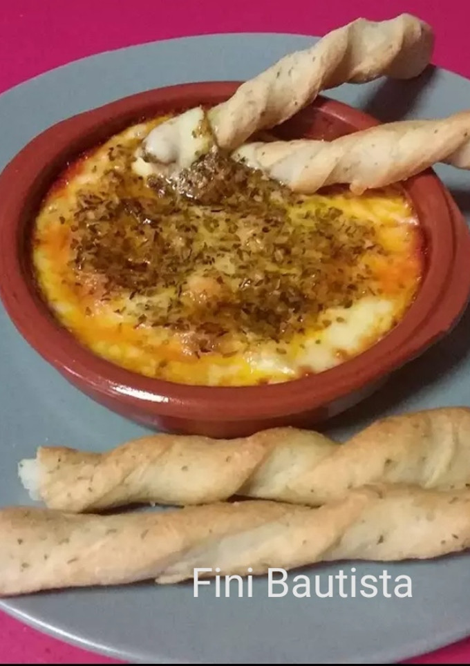 Una foto de Queso provolone al horno