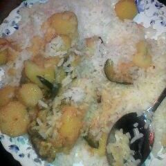 A picture of Steamed rice and bananas.