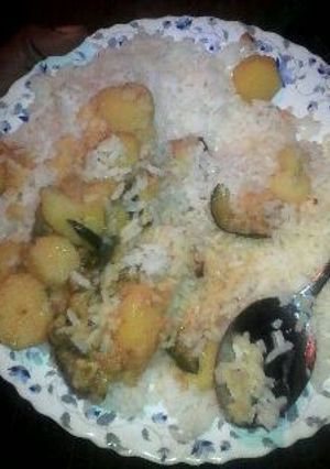 A picture of Steamed rice and bananas.