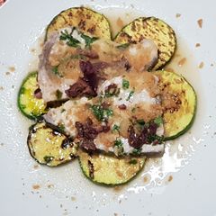 A picture of Swordfish with zucchini.