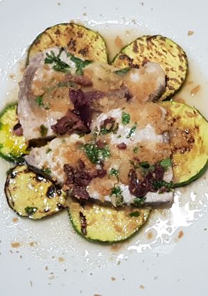 A picture of Swordfish with zucchini.