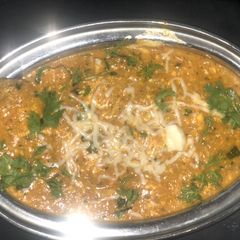 A picture of Paneer and Cheese Butter Masala.