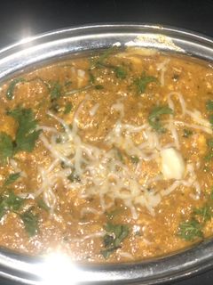 A picture of Paneer and Cheese Butter Masala.