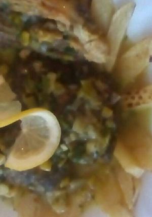صورة لوصفة سفيرية بكرات سبانخ مع دجاج