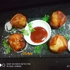 A picture of Paneer bread bonda.