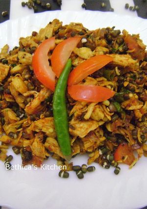 A picture of Sauteed Chicken with Whole Black Gram Lentil.