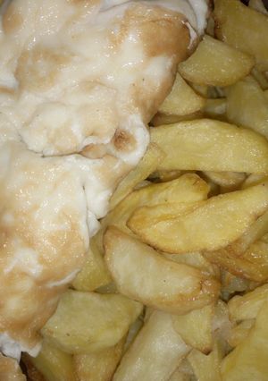 A picture of Fried chips with egg.