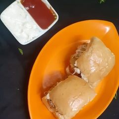 A picture of Veg Cheesy pattice pav.