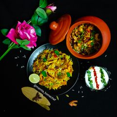 A picture of Matka Veg Dum Biryani.