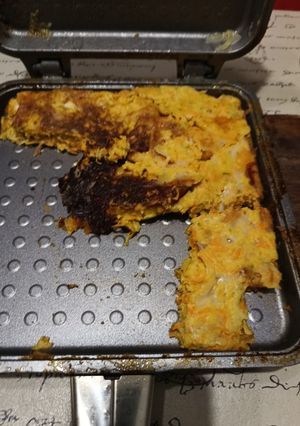 Una foto de Tortilla zucchini y zanahoria en flip