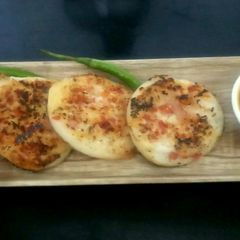 A picture of Easy rawa uttapam with sambhar.