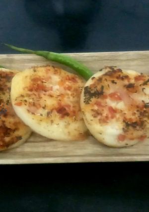 A picture of Easy rawa uttapam with sambhar.