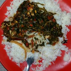 A picture of Vegetable stew with white rice.