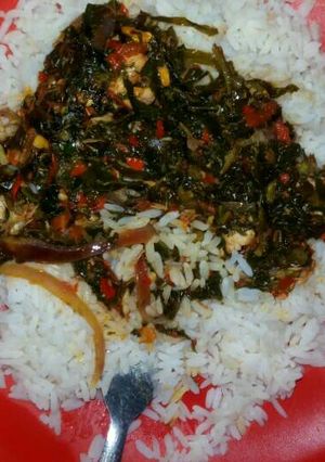 A picture of Vegetable stew with white rice.