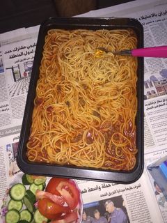 صورة لوصفة معكرونة بالصلصة واللحمة