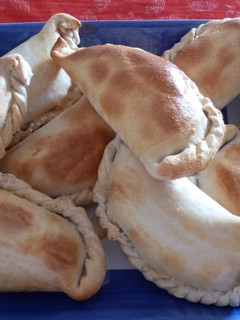 Una foto de Empanadas de cebolla o Pequén