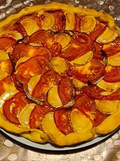 Une photo de Tarte tomate chèvre miel