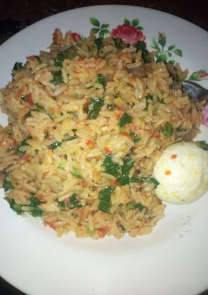 A picture of Rice with vegetables.