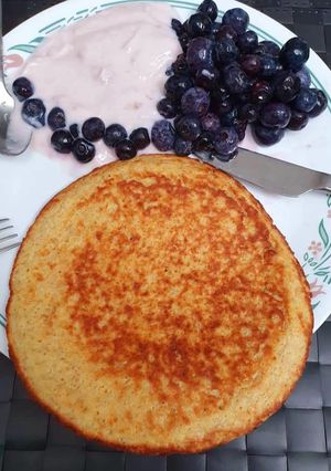 A picture of Sweet pancake with blueberries.