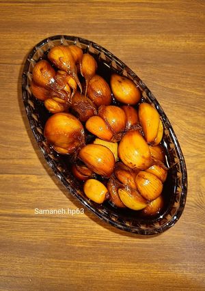 عکسی از دستور سیر ترشی با شیره خرما🌺