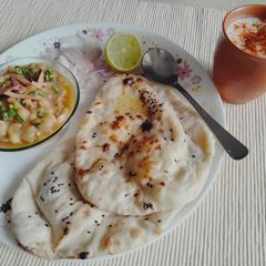 A picture of #cookpadindia#Aloo stuffed kulcha matar with masala chaach.
