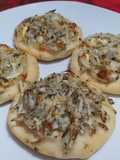 Pizzetas De Cebolla Y Queso
