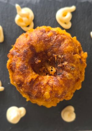 Una foto de Donuts de tortilla de patatas en tempura