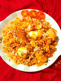 A picture of Kolkata Style Chicken Biryani.