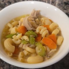 A picture of Sopas (Filipino Chicken Noodle Soup).