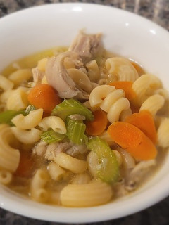 A picture of Sopas (Filipino Chicken Noodle Soup).