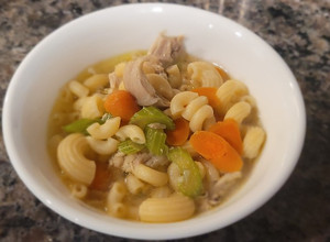 A picture of Sopas (Filipino Chicken Noodle Soup).
