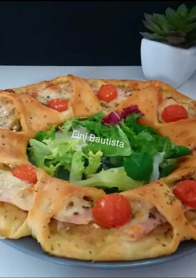 Una foto de Corona de pizza