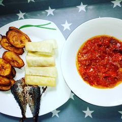 A picture of Fried yam, fish, plantain with pepper mix 😋😋😋😋.
