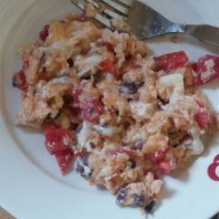 Eggs with onions and tomatoes A picture of Eggs with onions and tomatoes.