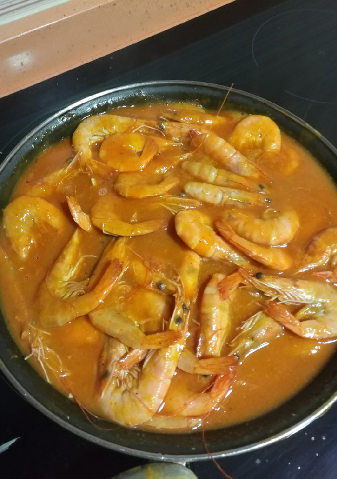 Una foto de Langostinos en salsa