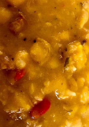 Una foto de Garbanzos con zapallo y trozos de longaniza