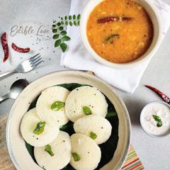 A picture of Rawa Idli with vegetables Sambhar & coconut chutney.