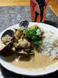Brad's pork and steamer clams in red Thai curry