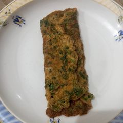 Omelet with coriander 🥚🥚 A picture of Omelet with coriander 🥚🥚.