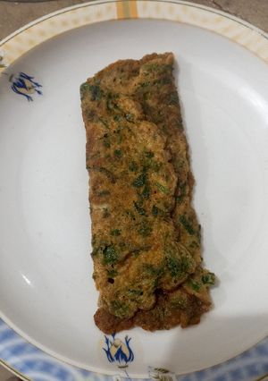 A picture of Omelet with coriander 🥚🥚.