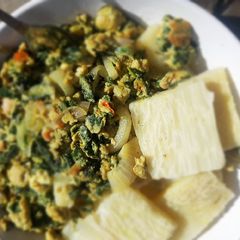 A picture of Boiled yam with spinach fried egg.
