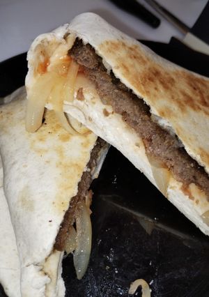 A picture of Beef burger tortilla wrap 🌯.