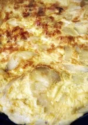 Una foto de Tortilla de patatas con cebolla