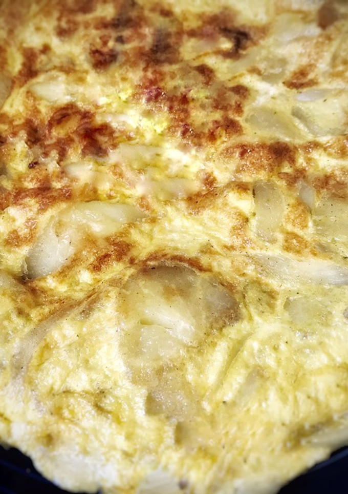 Una foto de Tortilla de patatas con cebolla
