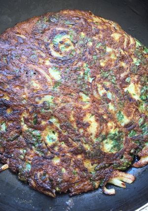Una foto de Tortilla espinaca y cebolla