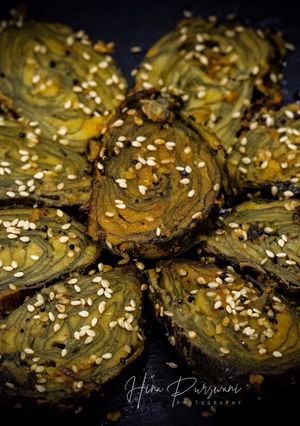 A picture of Patra | Spicy Colocassia leaves layered and steamed.