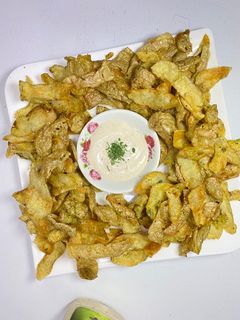صورة لوصفة سناك قشور البطاطس المقرمشه بالاعشاب 🥔