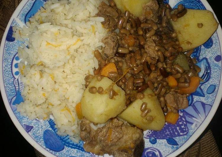 Carroted rice with special ndengu and beef Carroted rice with special ndengu and beef