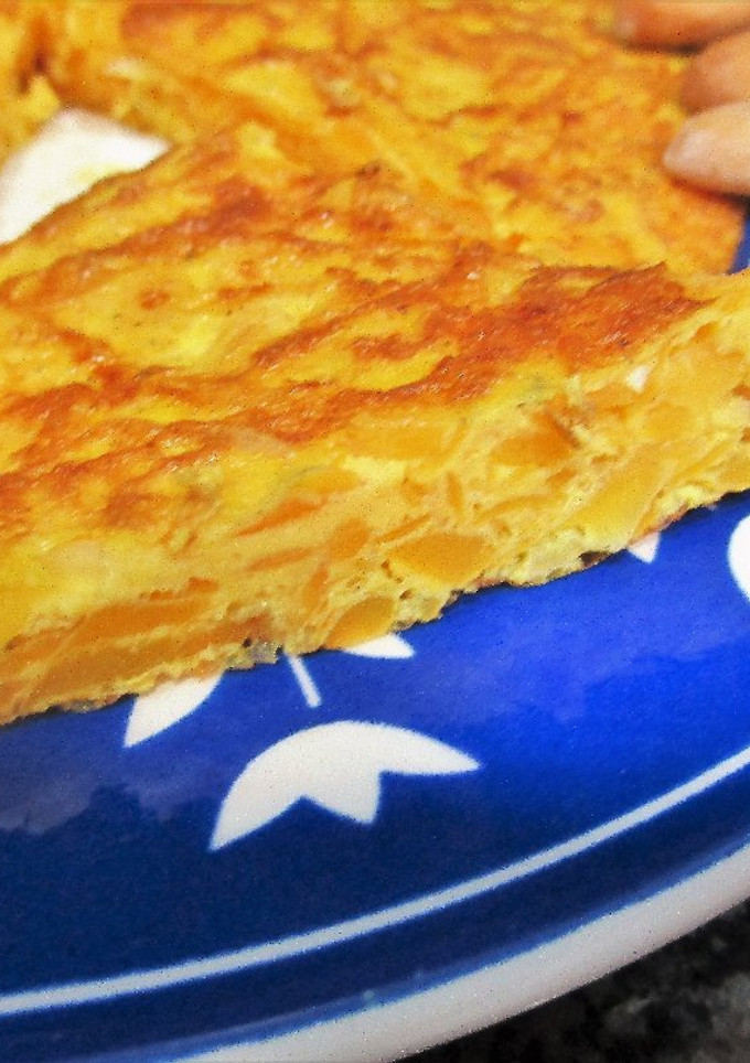 Una foto de Tortilla de calabaza rallada y queso tipo Philadelphia para llevar