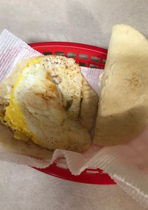 A picture of Daddies too early in the morning fried egg wraps.